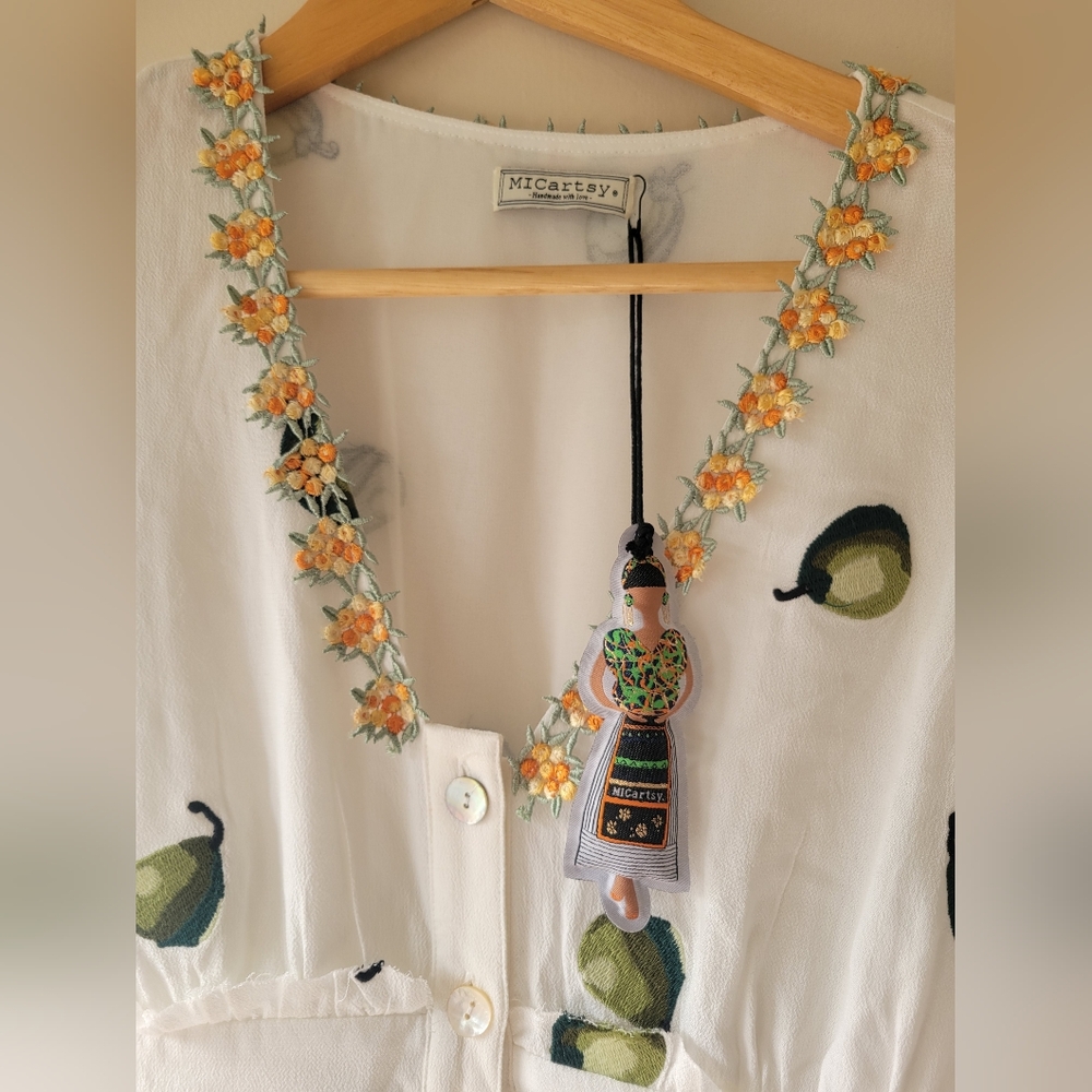 MiCartsy White Embroidered Button-Front Dress with Yellow Floral Trim